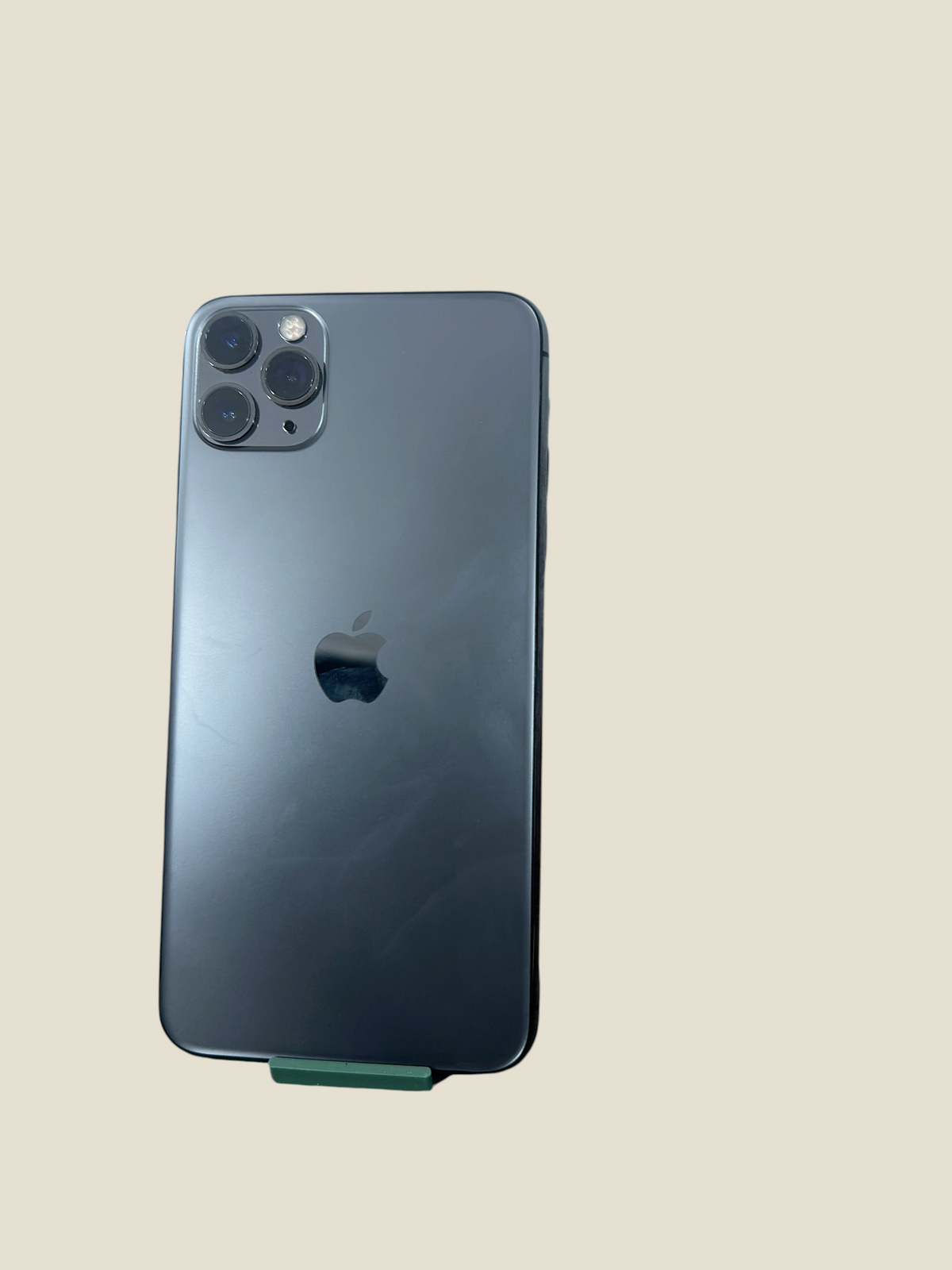 Iphoneio Official iPhone 11 Pro in space grey with a triple-camera system and glass back on a black background