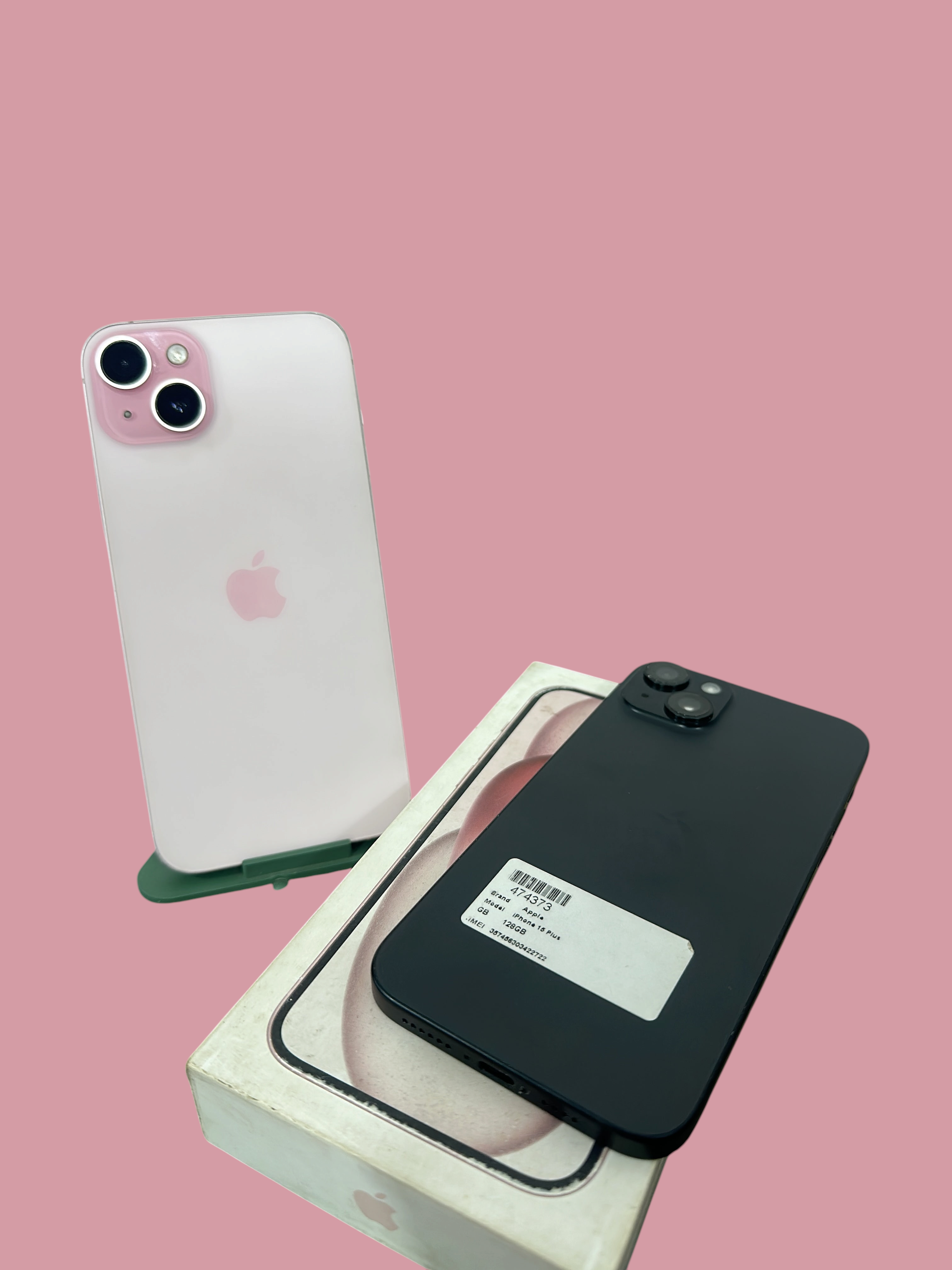 Iphoneio Official Apple iPhone 15 Plus smartphones in pink and black with original packaging box on black background