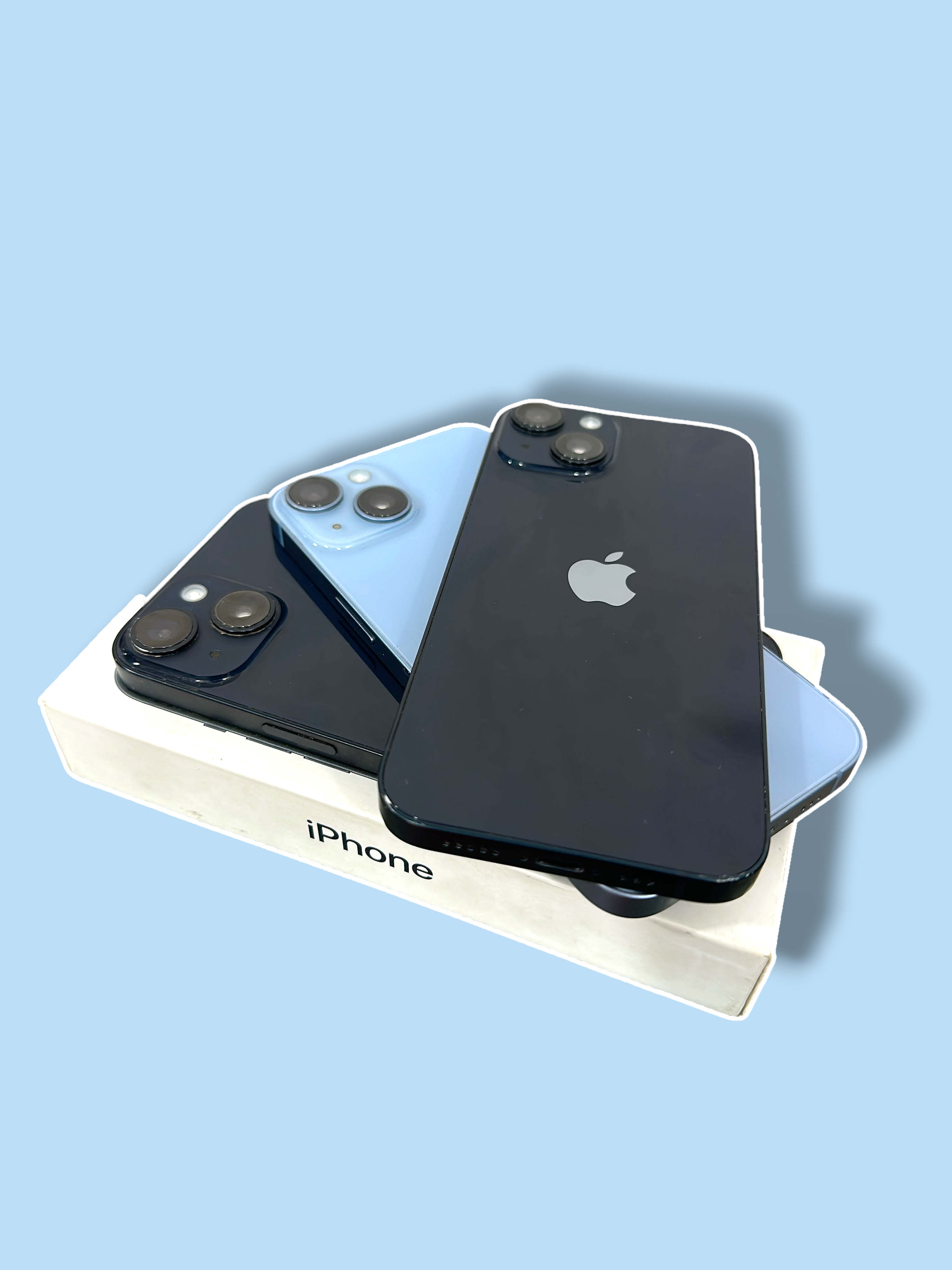 Iphoneio Official premium smartphones in black and light blue stacked on a white box with dual-camera systems.