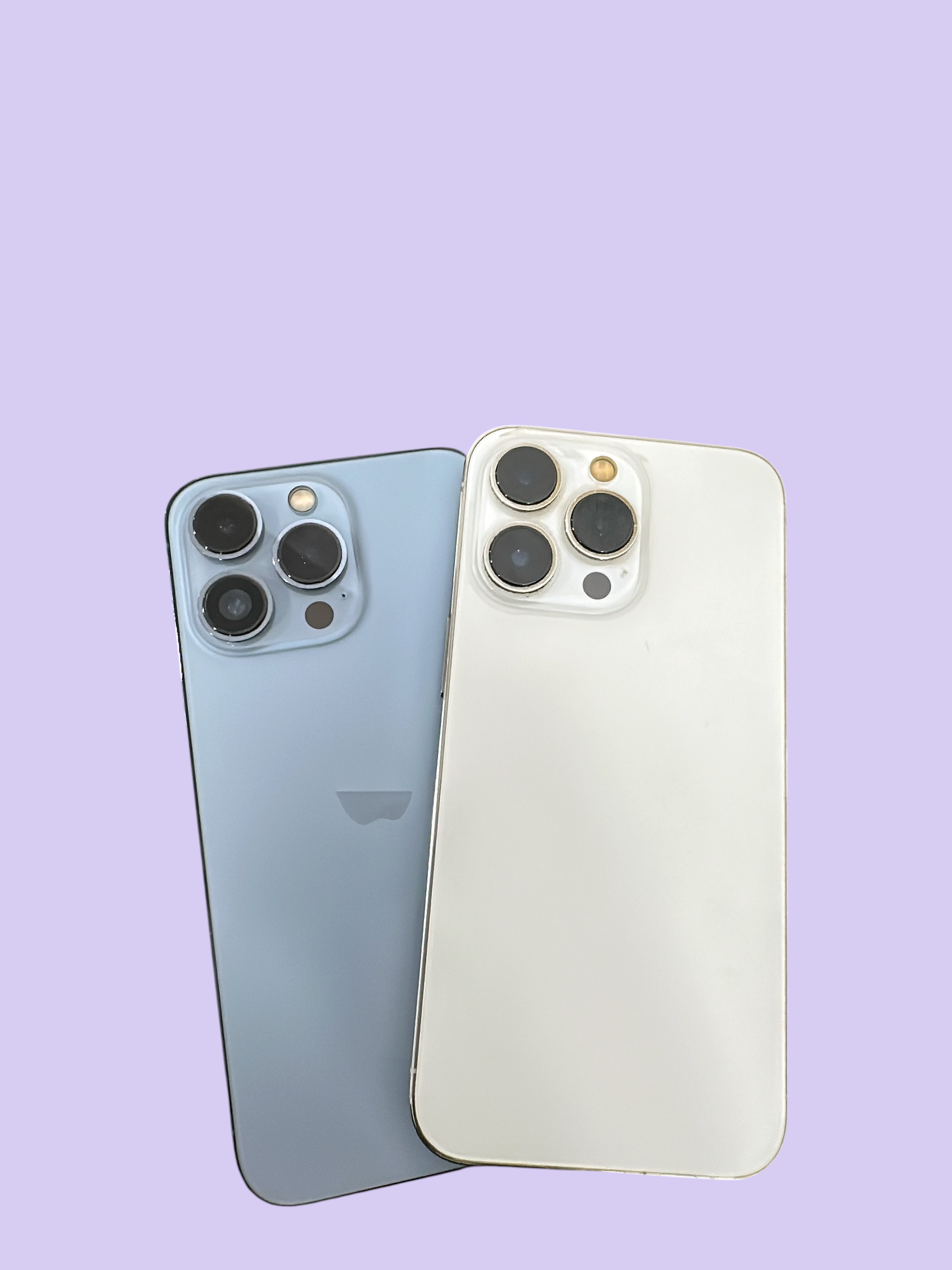 Iphoneio Official premium smartphones in light blue and white with triple-camera systems on a black background