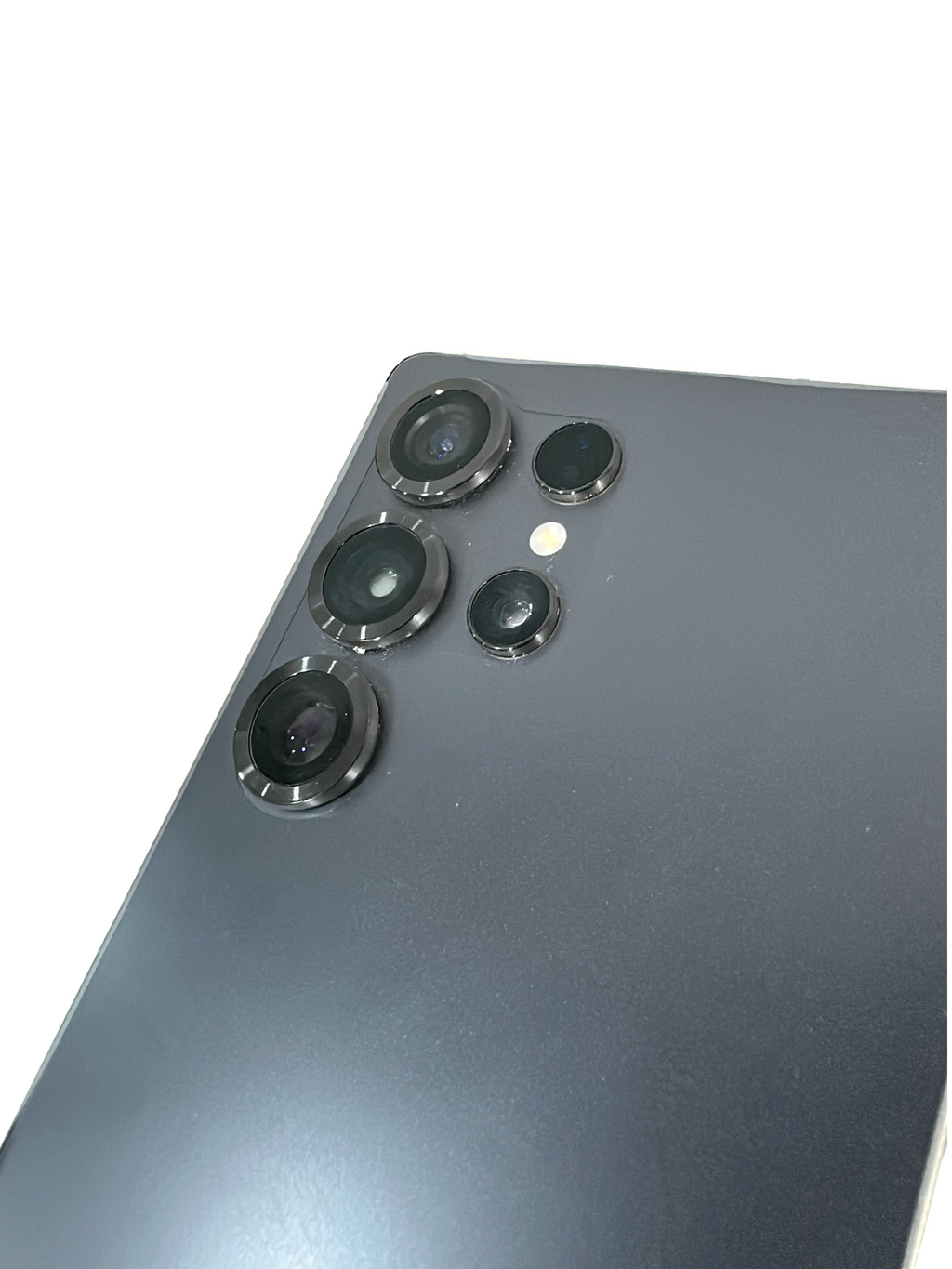 Iphoneio Official Galaxy S25 smartphone back panel showing the multi-lens camera system against a black background