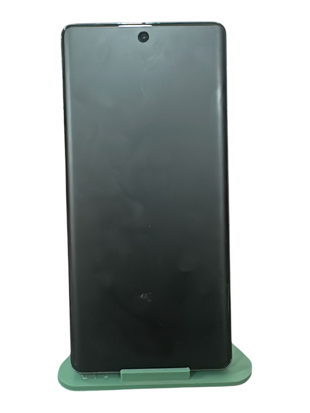 Iphoneio Official Google Pixel smartphone in obsidian black with a sleek edge-to-edge display on a green stand