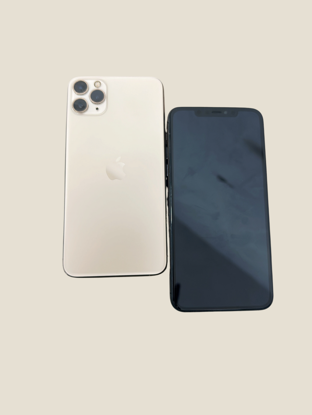 Iphoneio Official iPhone 11 Pro in gold with triple-camera system shown alongside a black smartphone screen