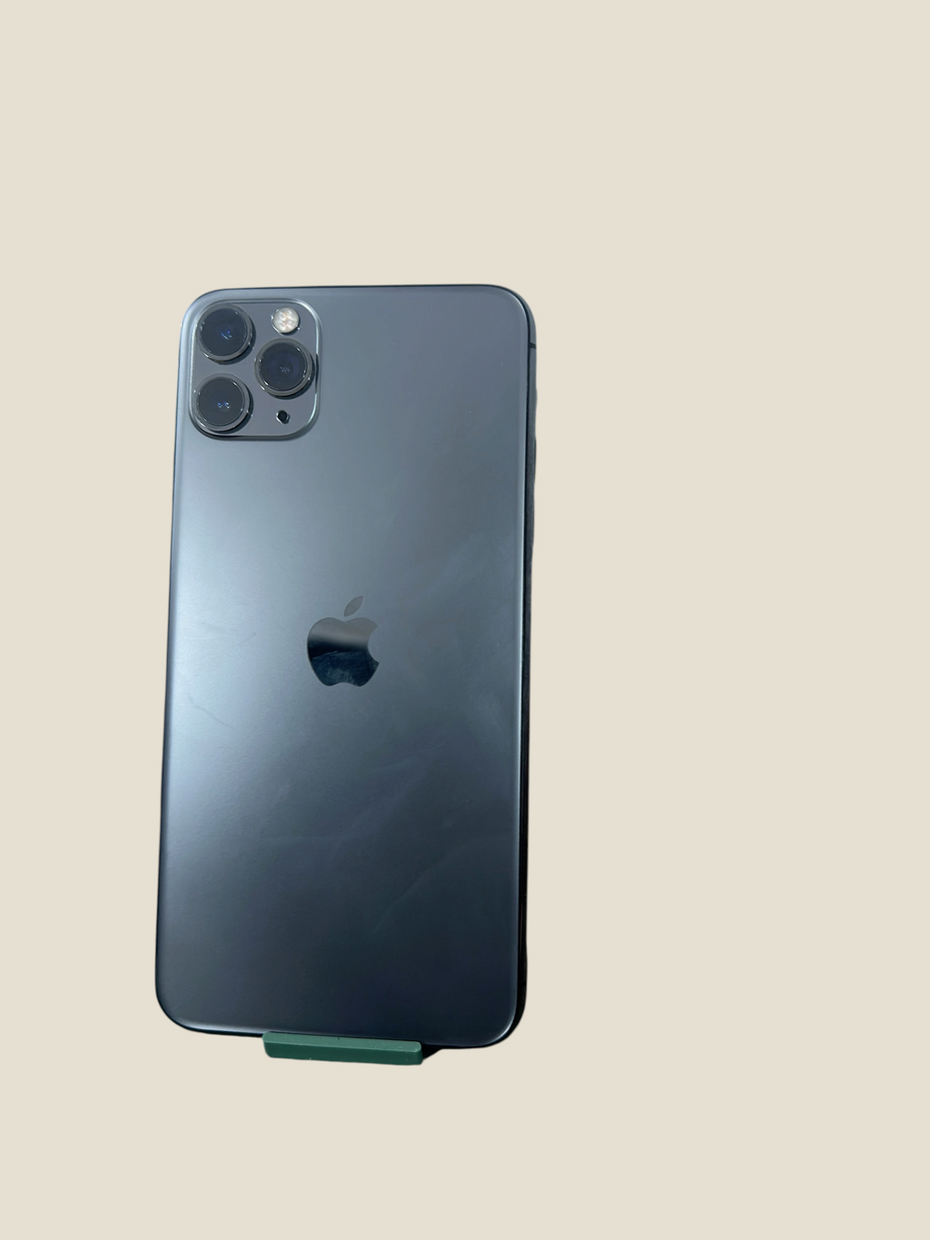 Iphoneio Official iPhone 11 Pro in space grey with a triple-camera system and glass back on a black background