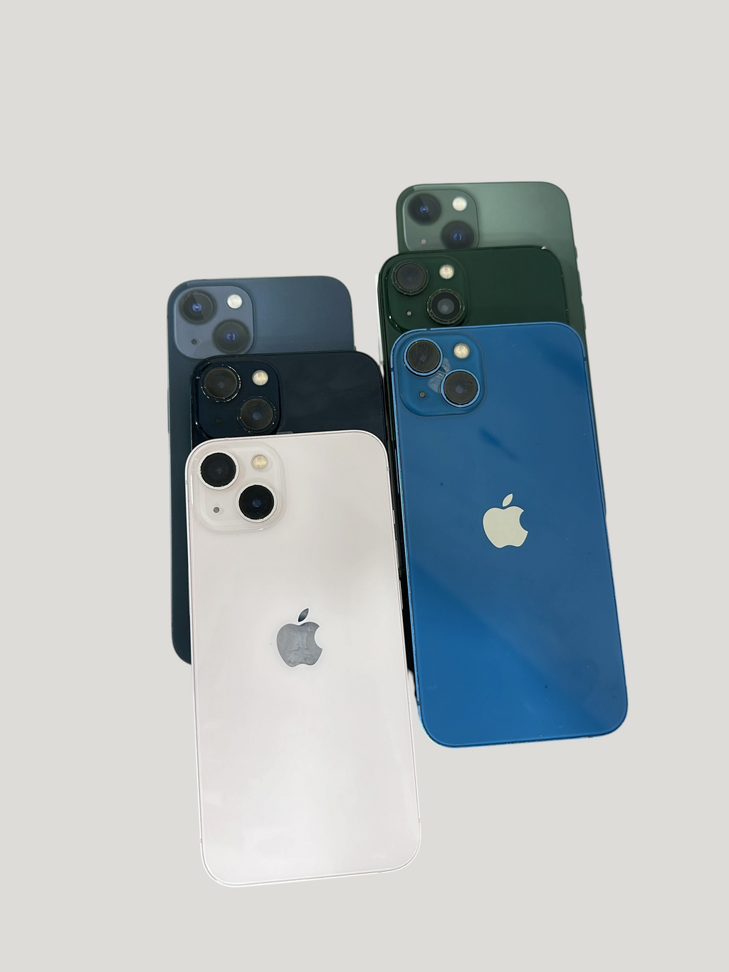 Iphoneio Official collection of Apple iPhone 13 smartphones in various colors including blue, pink, and green.