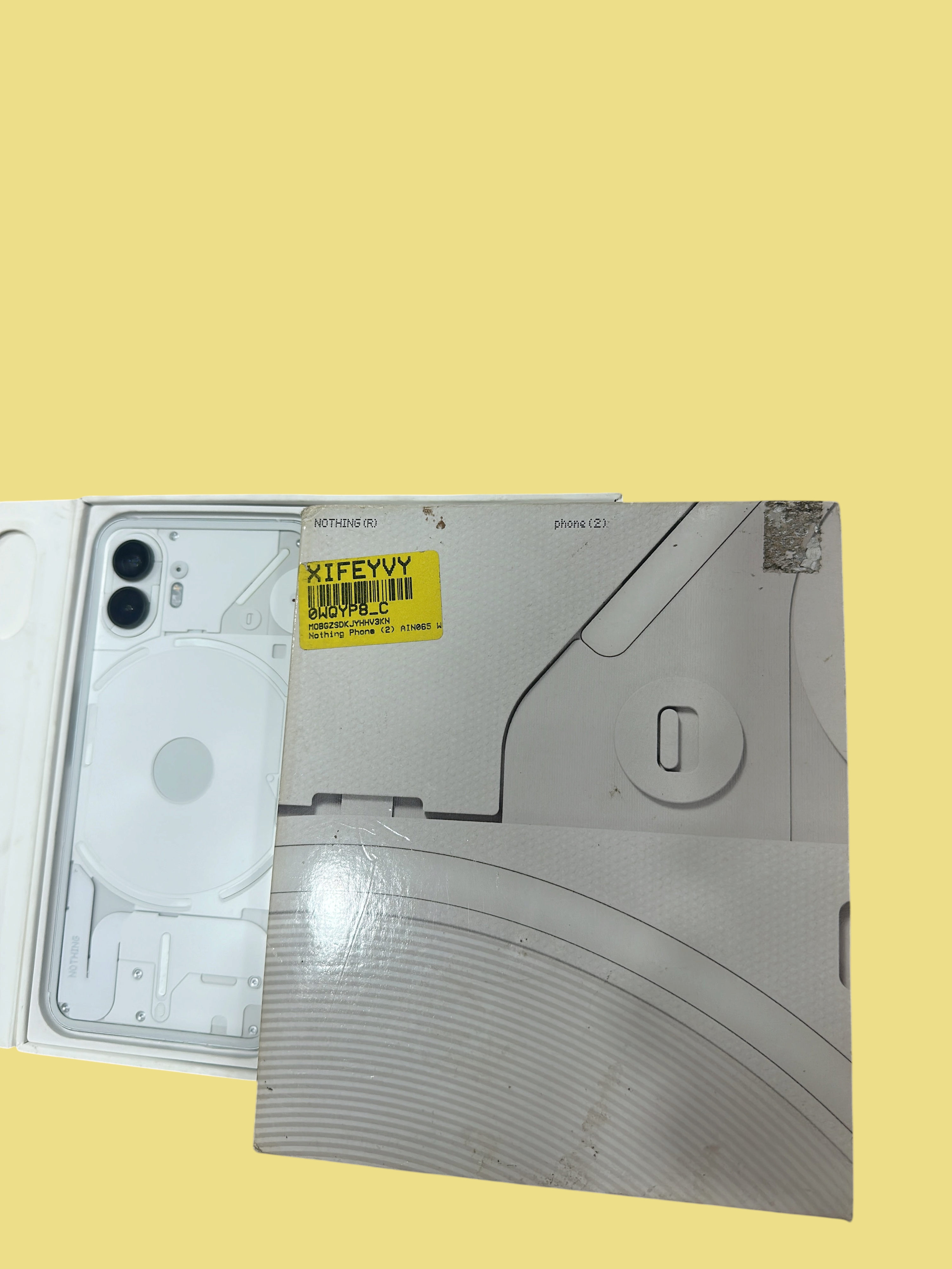 Iphoneio Official Nothing Phone 2 in white with transparent back design and Glyph Interface in its original packaging