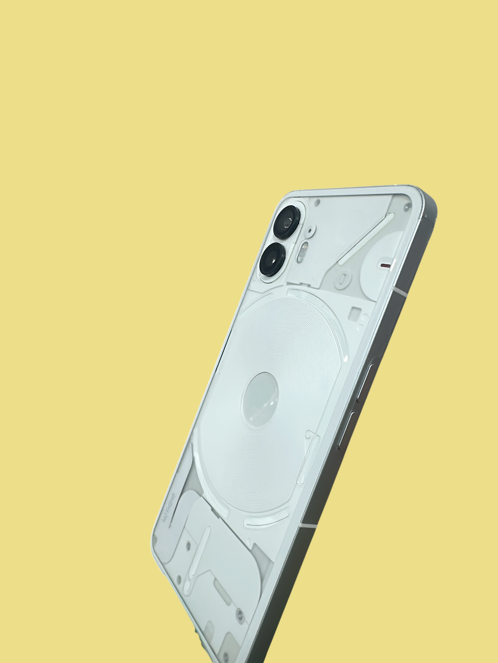 Iphoneio Official Nothing Phone 2 in white with a transparent back design and dual camera system