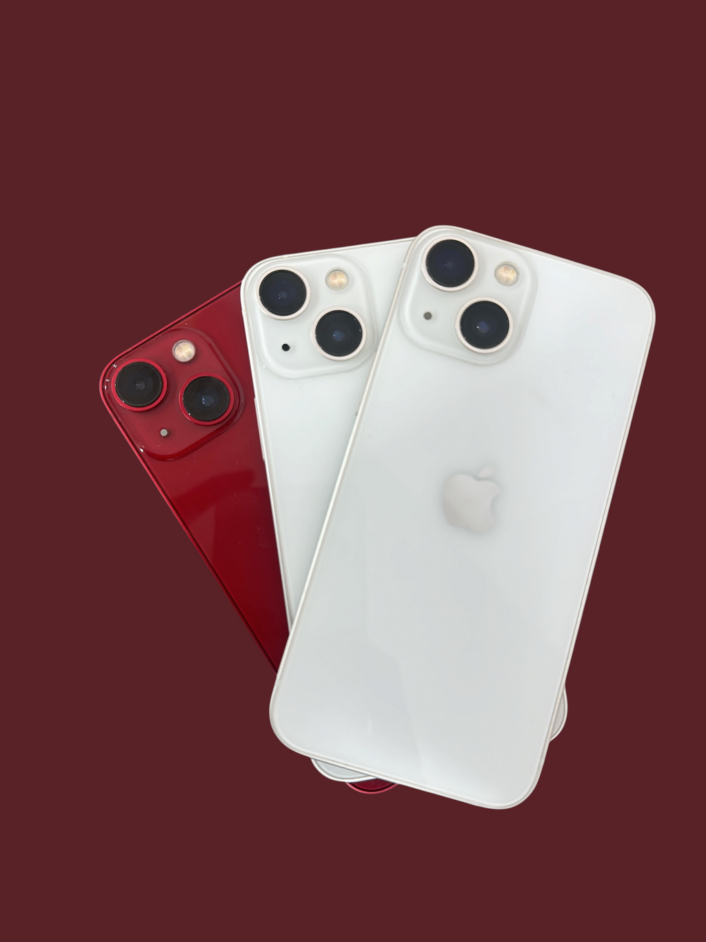 Iphoneio Official premium smartphones in white and red with dual-camera systems and sleek glass back designs.