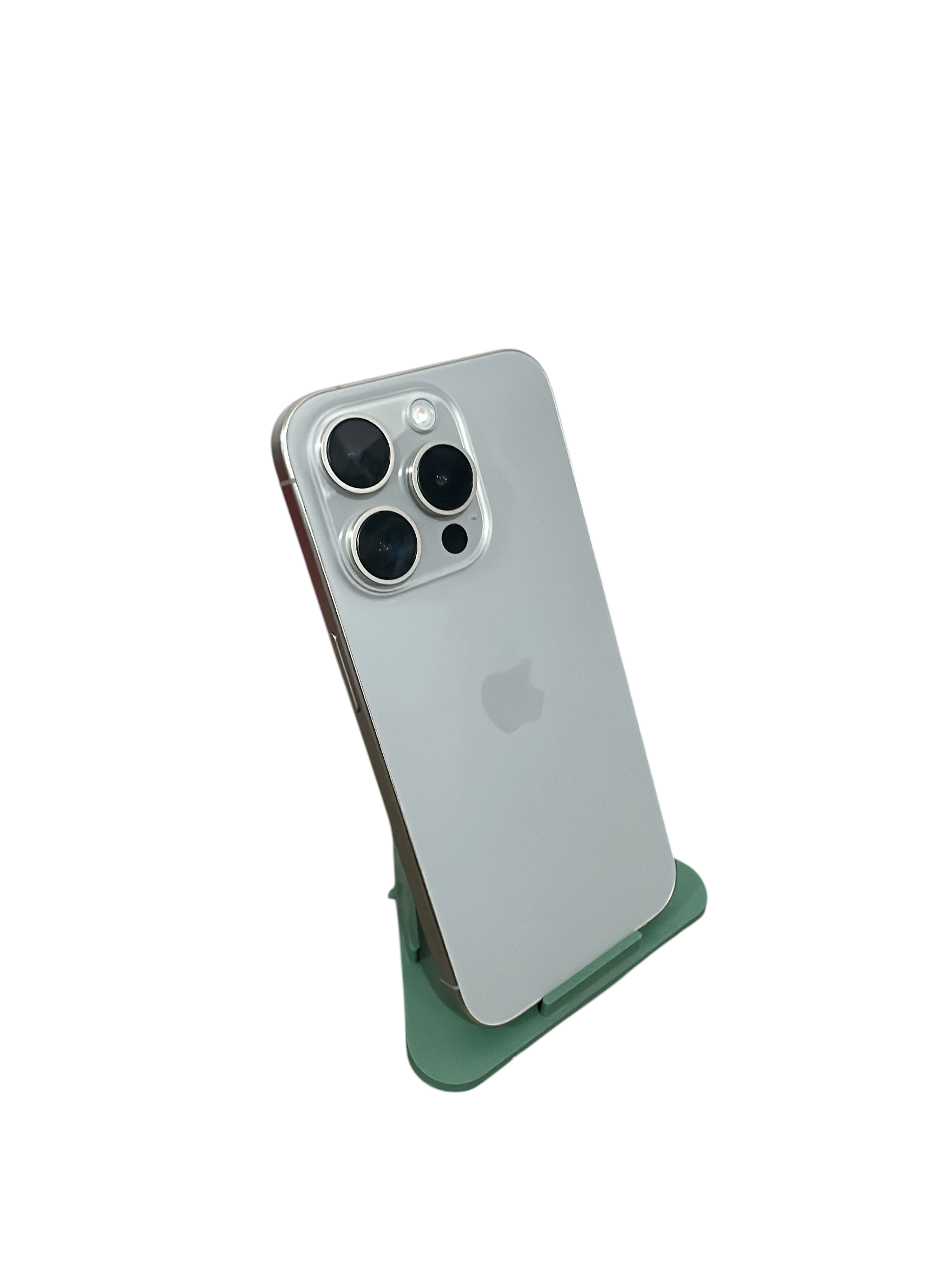 Iphoneio Official premium smartphone in silver with a triple-lens camera system, displayed on a green stand.