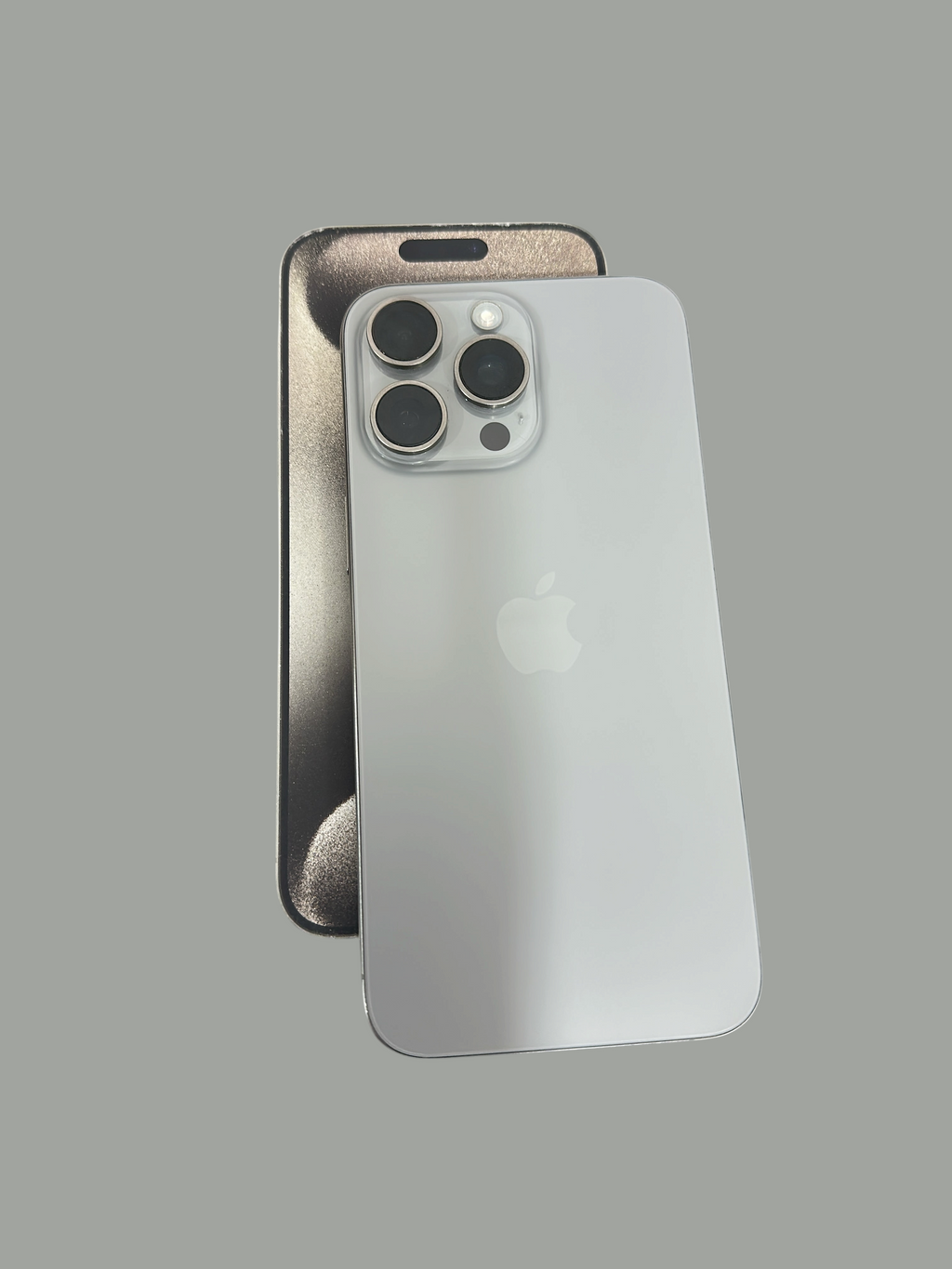 Iphoneio Official premium smartphone with titanium frame and triple-camera system shown against a black background.