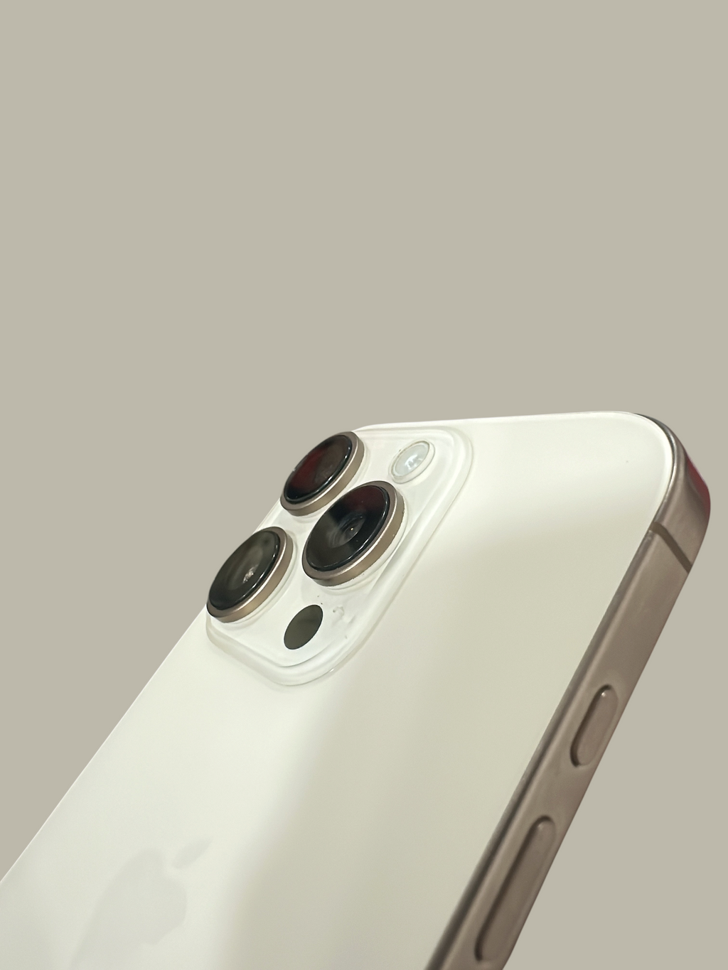 Iphoneio Official premium white smartphone featuring a triple-lens camera system against a black background